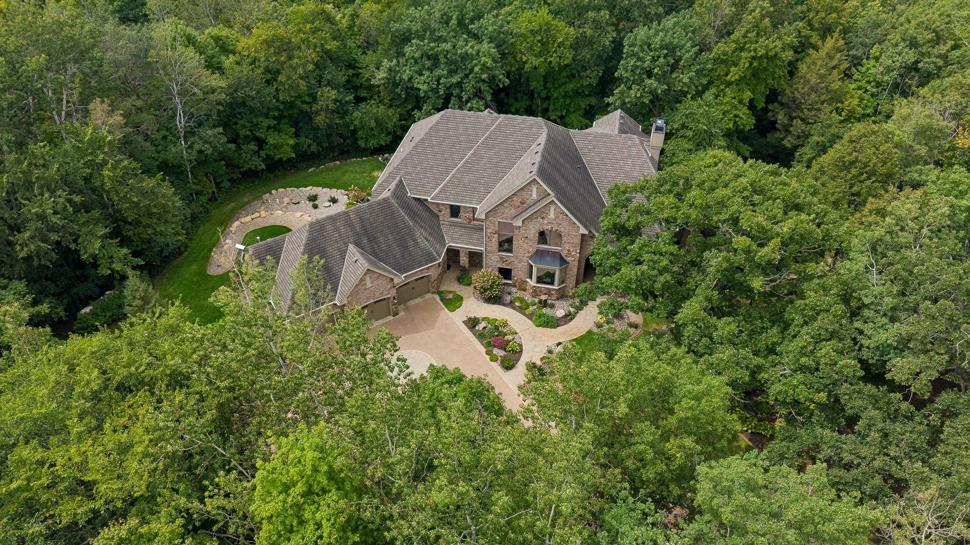 Welcome home to this secluded 48 acre private estate just minutes from Hwy 169.
