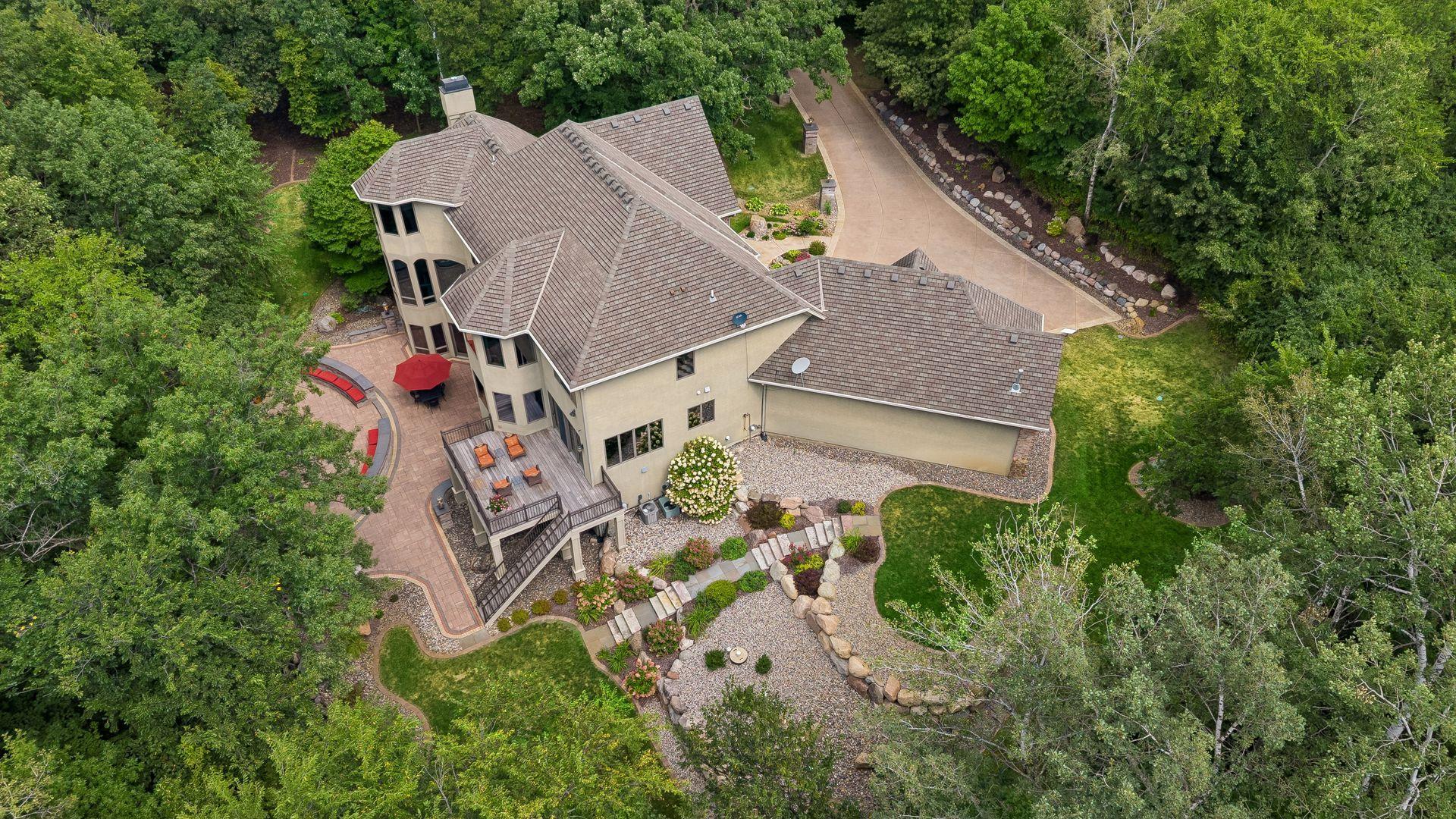 Extended private scenic driveway with tree top arch