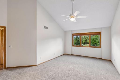 Large primary bedroom with private bath and walk-in closet. Brand new plush carpet. Fresh paint throughout.