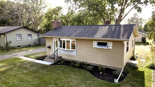 Front of Home with New Roof and Fresh Mulch