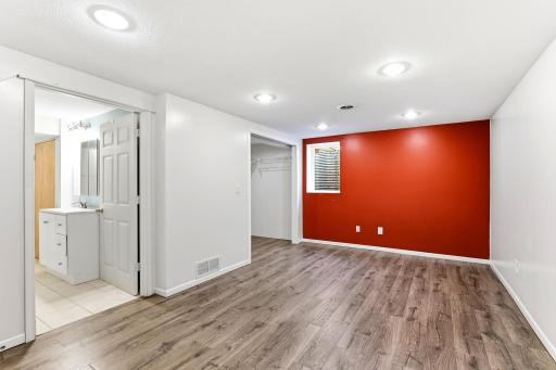 Spacious Lower-Level Primary Suite with Exceptional Closet Space