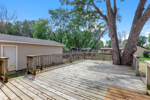 Outdoor Living at Its Best with a Generous Deck & Expansive Yard