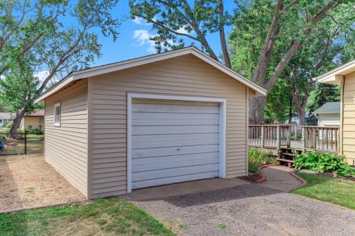 Garage that has been newly sided and has a new roof