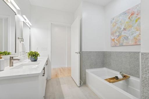 Fall in love with the spa-like primary bathâsleek surfaces, clean lines, and calming natural light throughout.