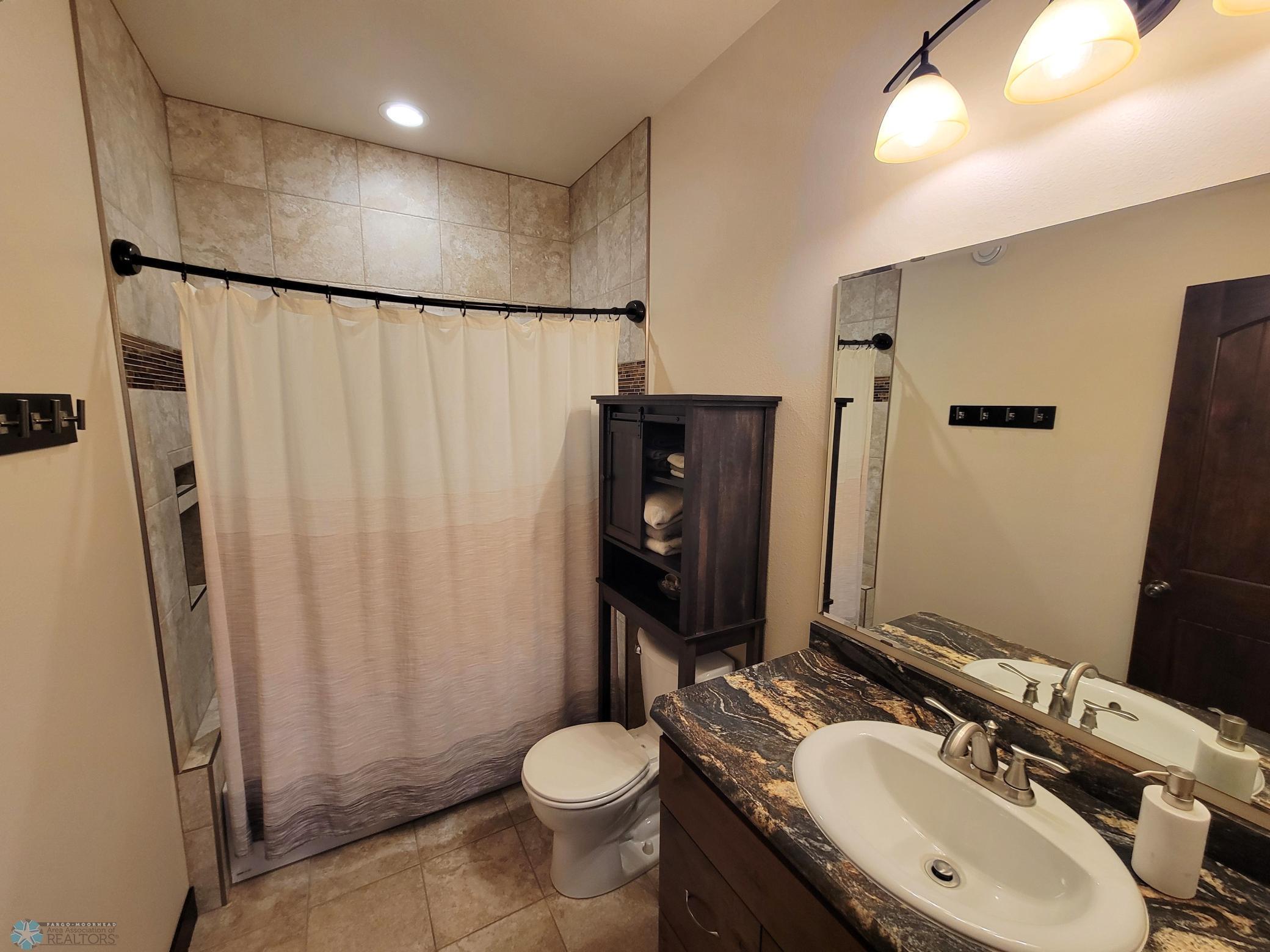 Main Level Full Bathroom