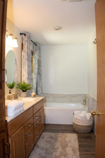 virtually staged primary bath.jpg