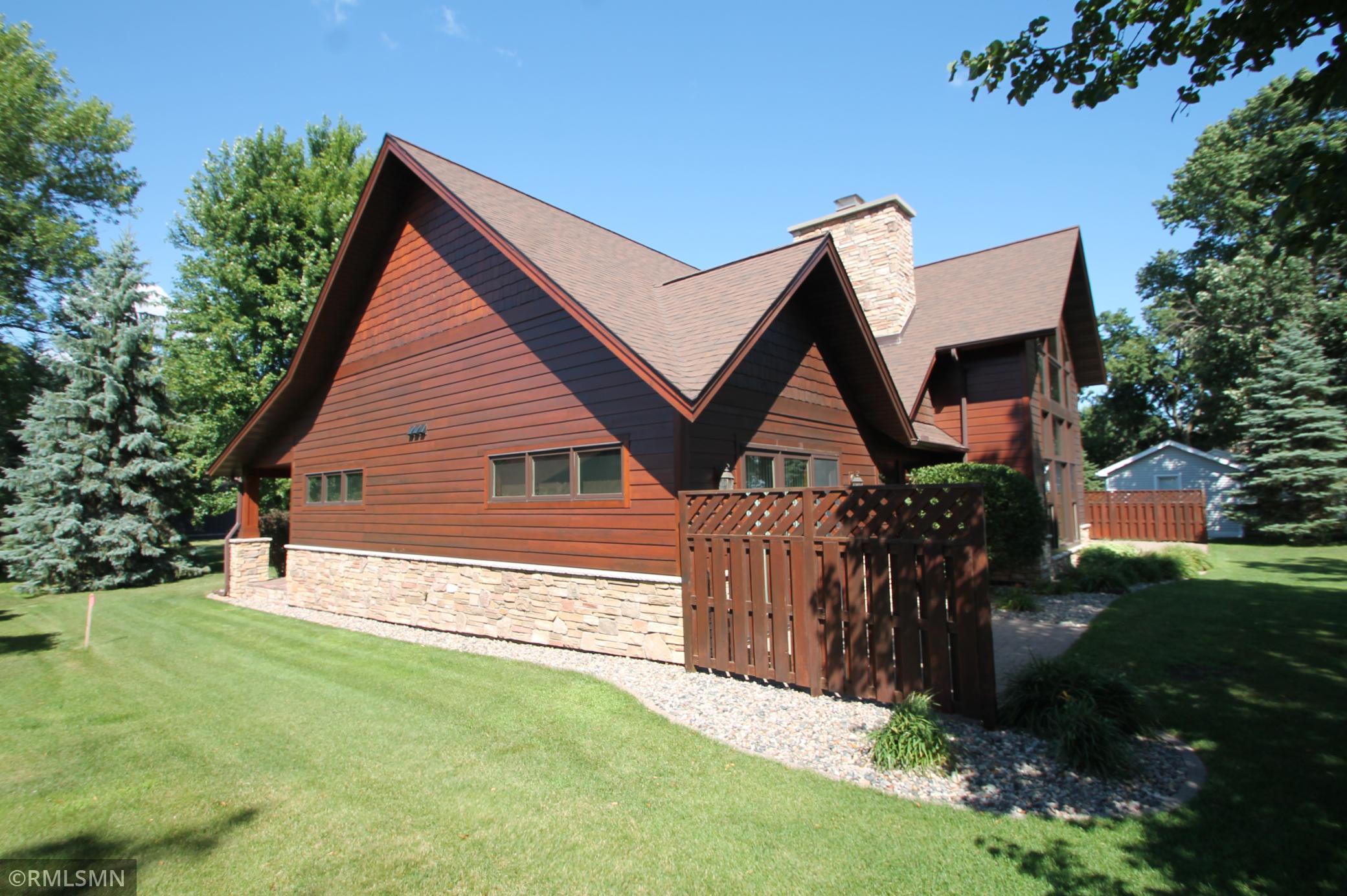 West side of home. Western Red Cedar and stone exterior.