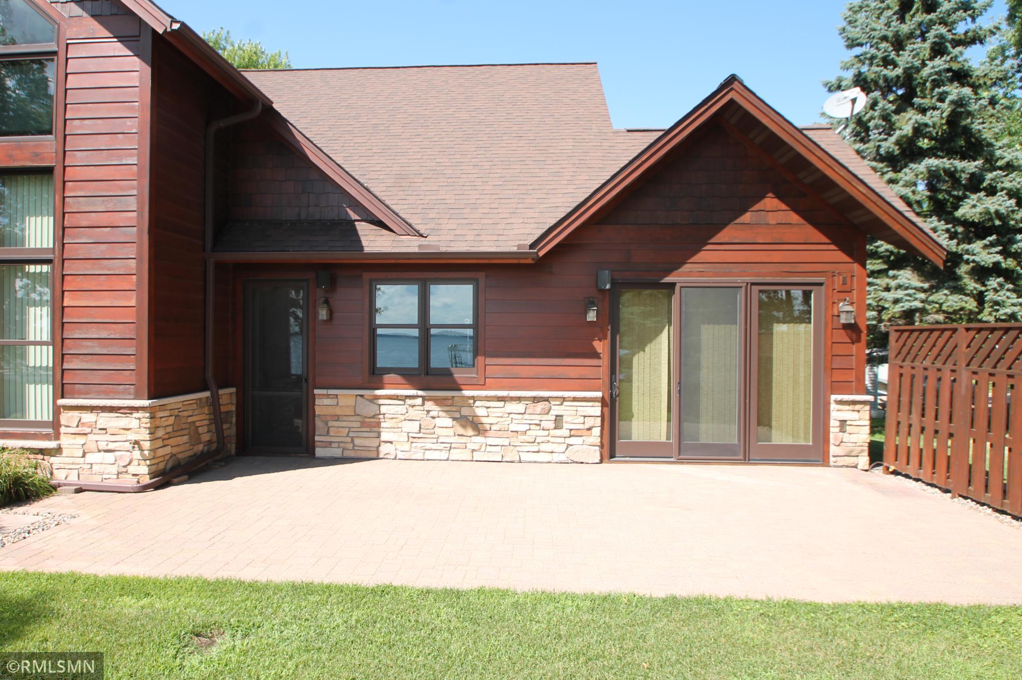 28 x 14 stone patio off the kitchen and sun room/den.