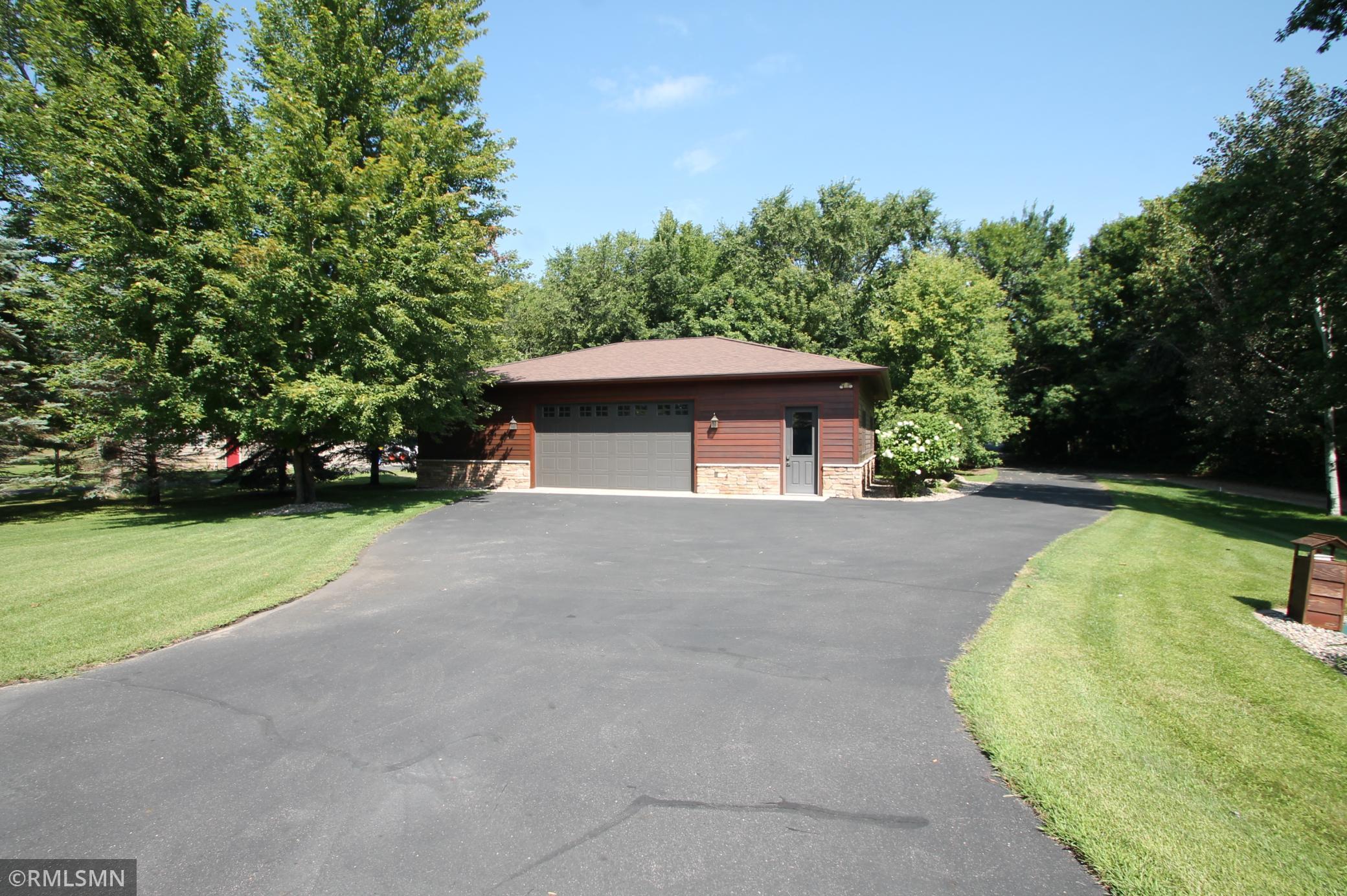48 x 36 detached garage is heated and insulated. Garage door measures 18 x 9.