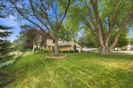 Mature trees provide a beautiful setting on this quiet cul-de-sac