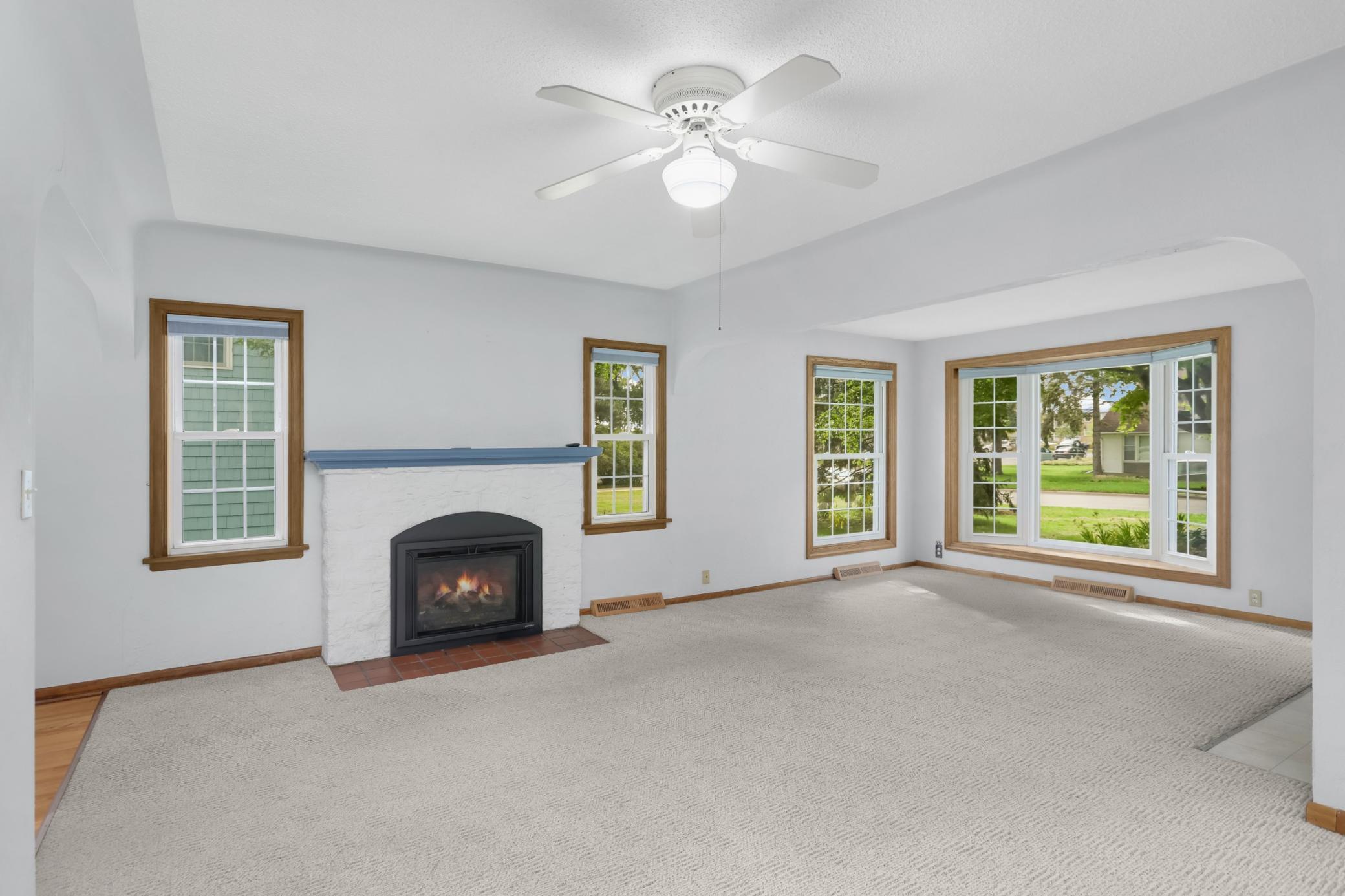The fireplace, upgraded to gas-burning. (with remote!), offers a cozy vibe in chilly months.