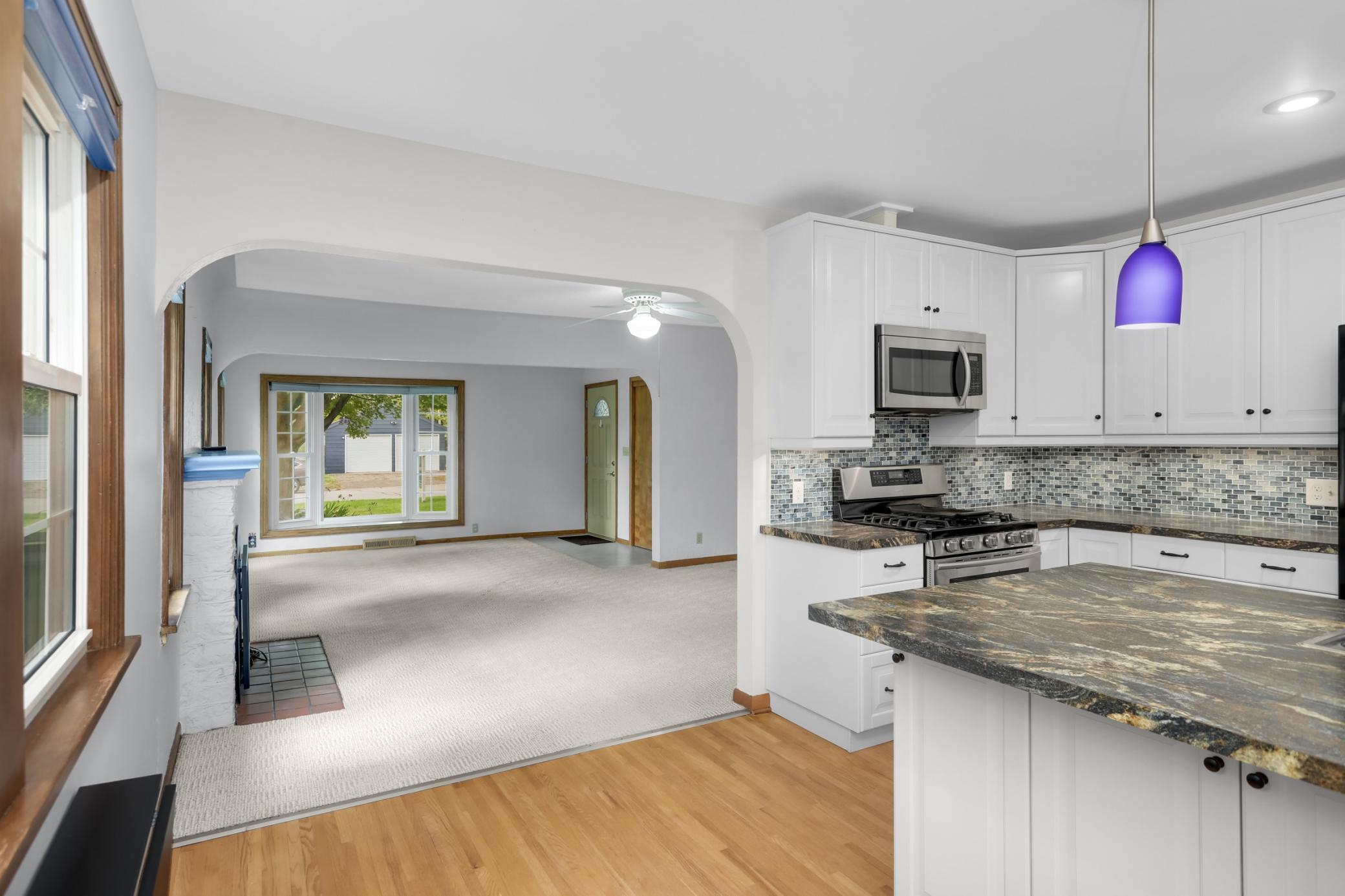 Looking back to the living and dining rooms from the kitchen.