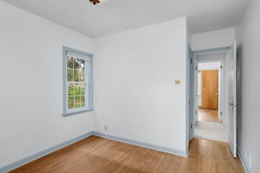 Looking through the hall to bedroom #2 on the main floor. The bath is conveniently located between the bedrooms.