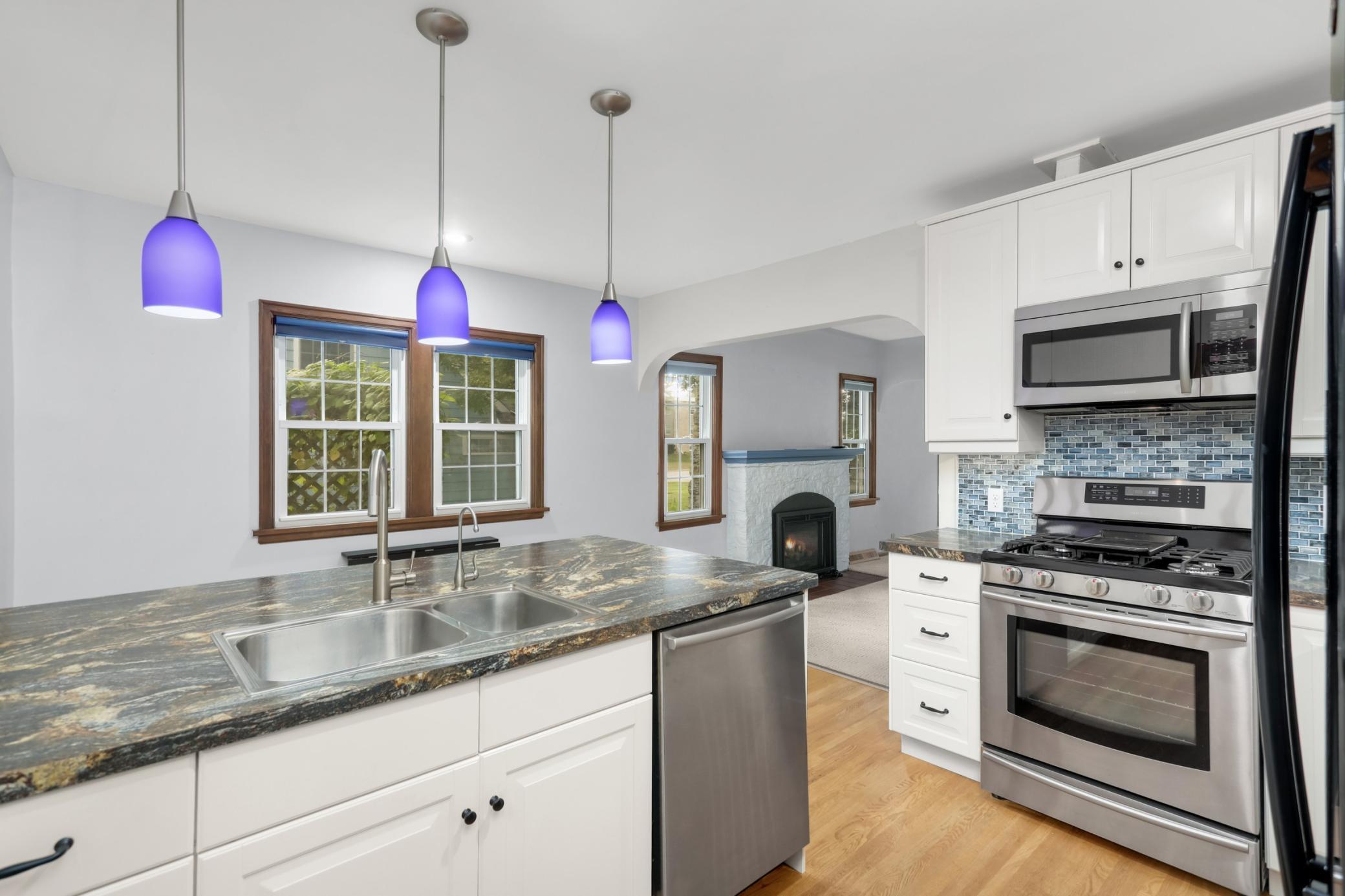 Having the sink in the peninsula makes it easy to take part in the conversation, even when you're cleaning up.