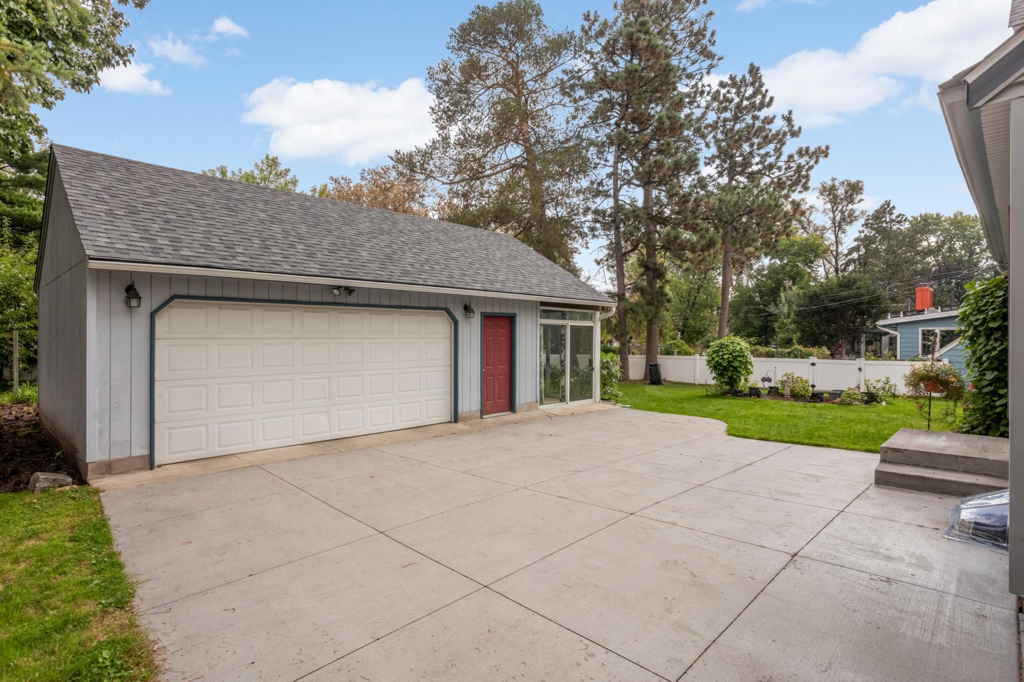 The 2.5-car garage holds all your toys and tools -- there's even a pull-down steps for attic storage!