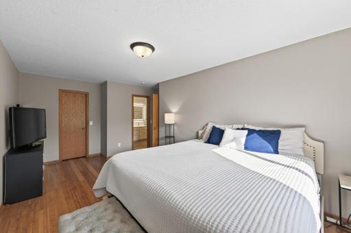 Complete with a walk-in closet and convenient access to the full walk-through bathroom.