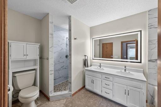 Enjoy the convenience of both a large soaking tub and separate walk-in shower.