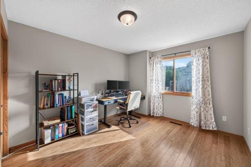 This secondary bedroom offers great flexibility for sleeping space, a home office or whatever best fits your needs.