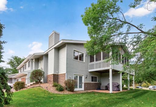 One of the perks of this end unit is the abundance of green space, perfect for setting up yard games or simply spending time outside.
