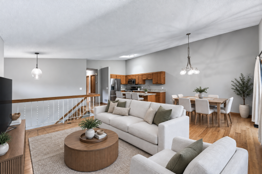 Image has been virtually staged. The open-concept design allows connection without sacrificing defined spaces.