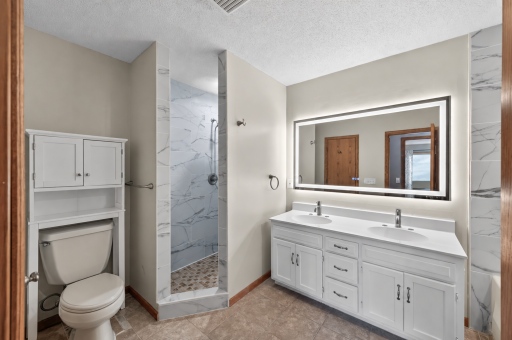 Enjoy the convenience of both a large soaking tub and separate walk-in shower.
