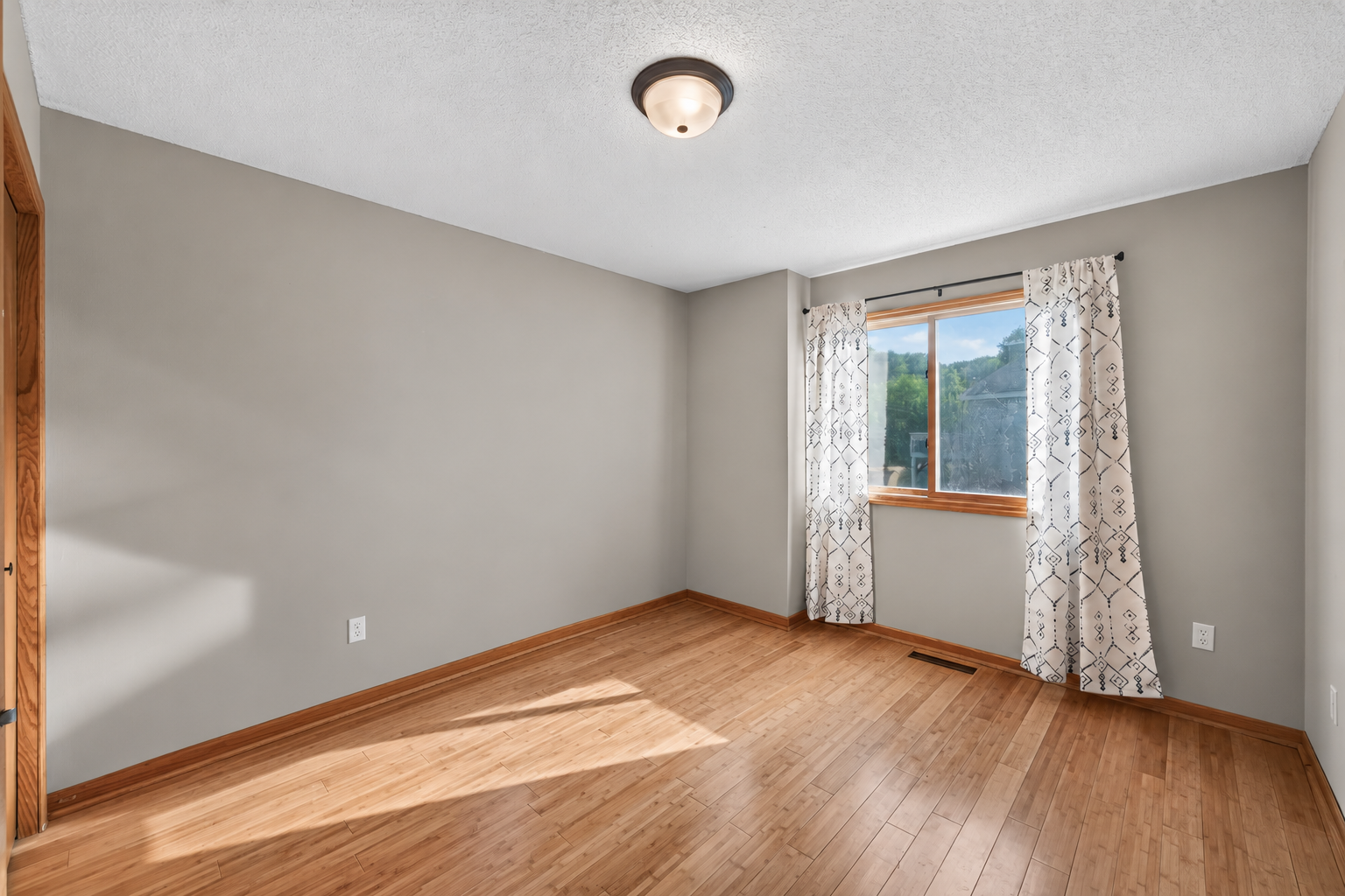 This secondary bedroom offers great flexibility for sleeping space, a home office or whatever best fits your needs.