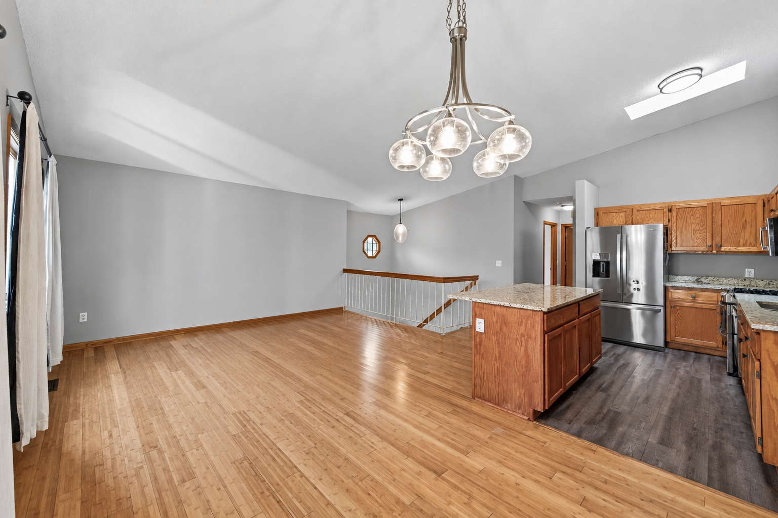 Large windows, skylights and modern light fixtures create a bright and inviting upper level!
