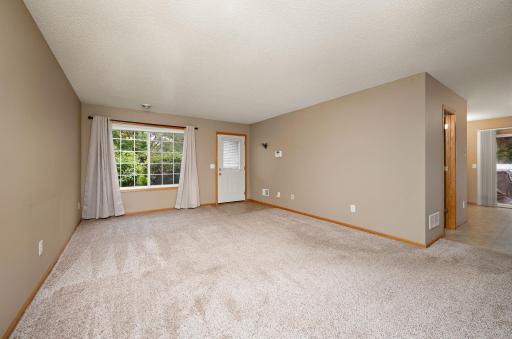 Spacious main floor living room with space for an additional dining area!