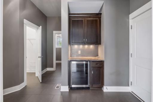 Lots of built ins in the mud room, perfect to grab and go your shoes and jackets. The closet on the left opens on both sides