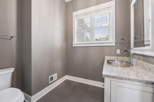 Well placed powder room on the main floor