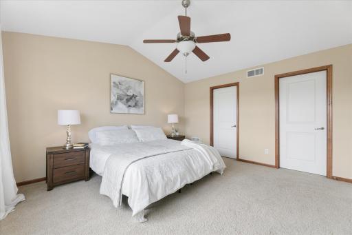 A spacious primary suite with generous walk-in closet space.