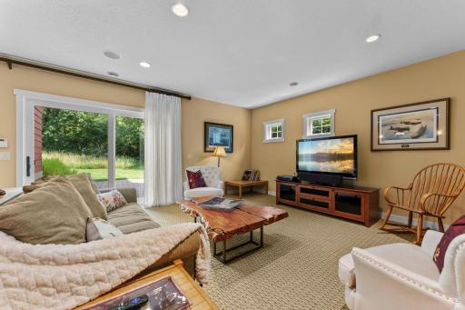 The finished lower level is an entertainer’s dream, featuring in-floor heat throughout and an expansive family room with walkout access to the backyard patio.