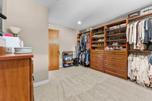 The ensuite also connects to a 12x11 walk-in closet with convenient pass-through access to the hallway.