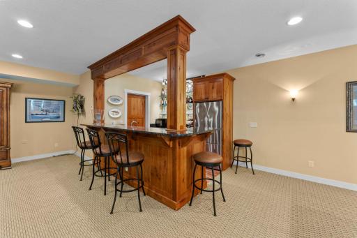 A 7x6 storage room is conveniently accessed from the wet bar.