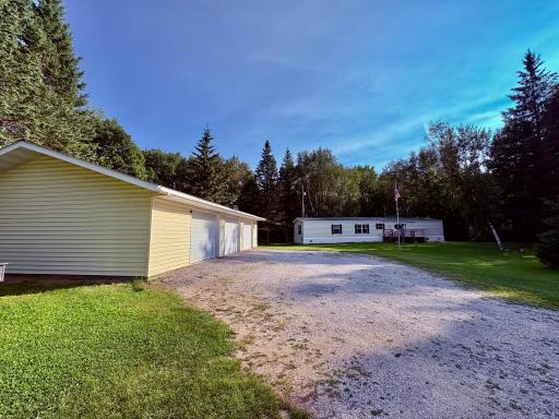 3 stall heated garage with 97 MHO