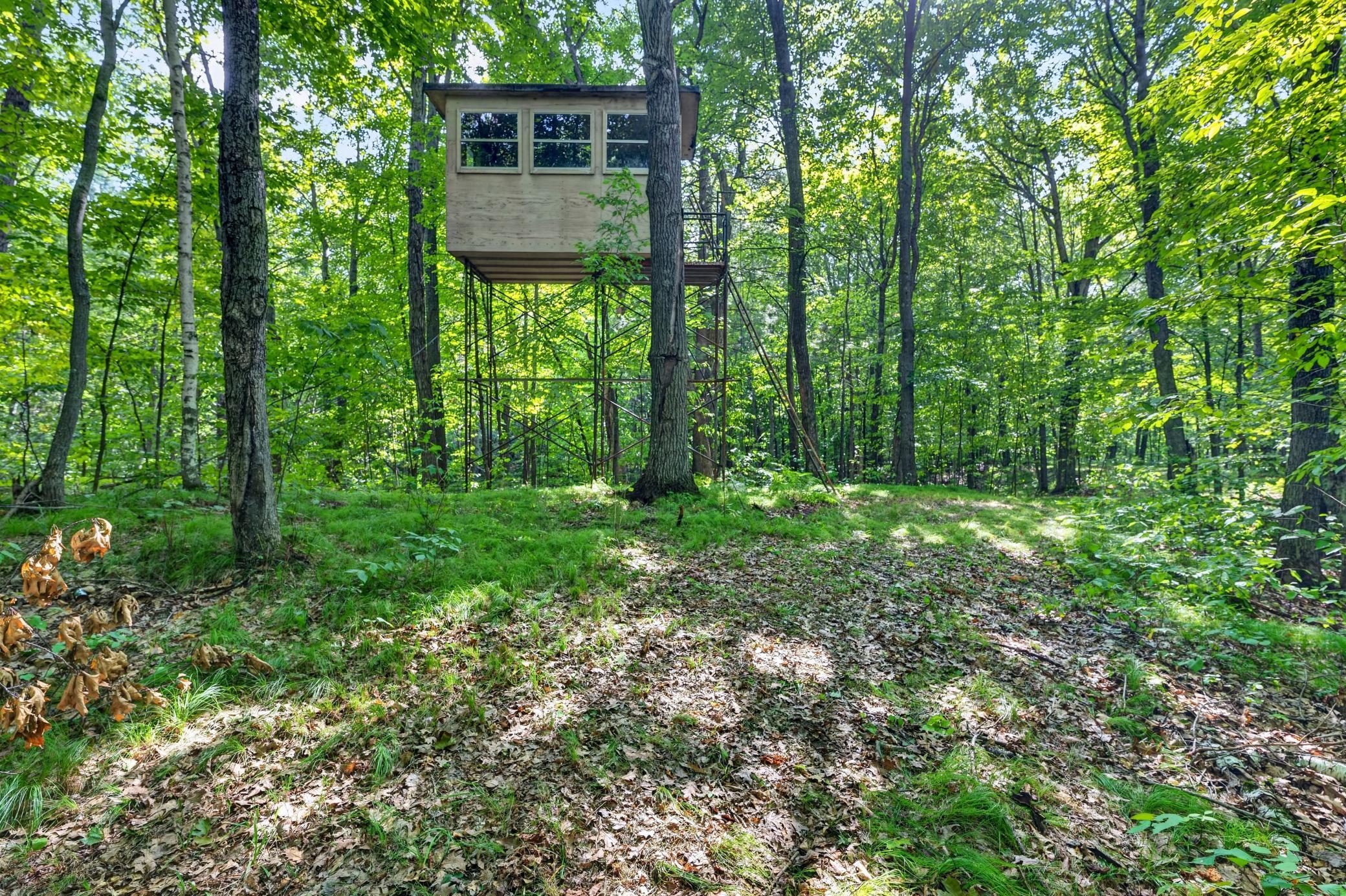 Multiple enclosed stands on property.