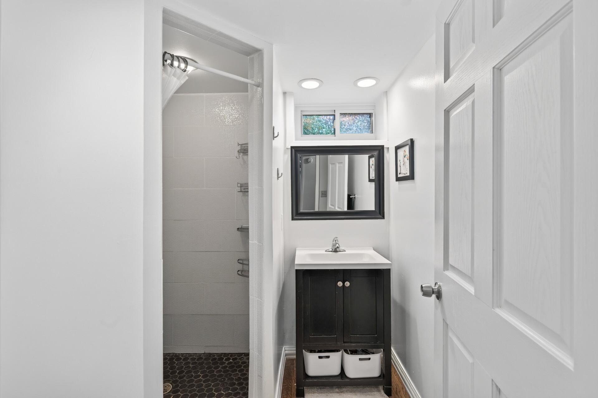 Downstairs Bath and entry to Garage