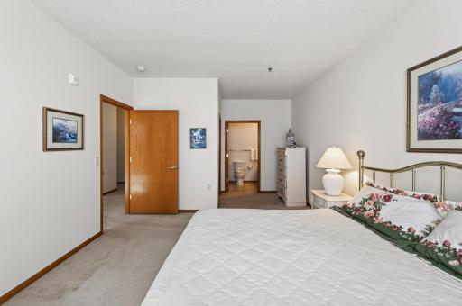 The en suite bathroom has a walk in shower.