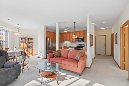 Photo for 15001 Burnhaven Drive, 216, Burnsville, MN 55306 - listing #7133606 Your cozy living room adjacent to the kitchen.
