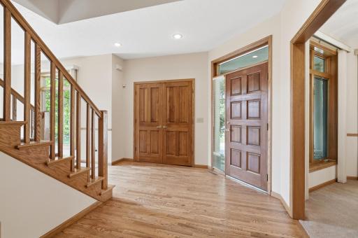 Another view of the entry featuring a large guest closet