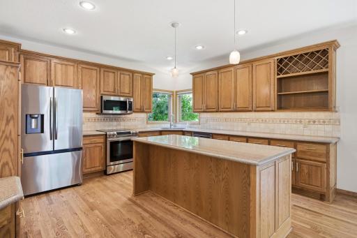 The kitchen is a real 'wow'. Beautiful hardwood floors, lots of cabinet space including display cabinet upper