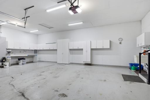 Anyone will love the garage. The floor will be cleaned after everything is moved out. lots of cabinets built in, plus nice work bench