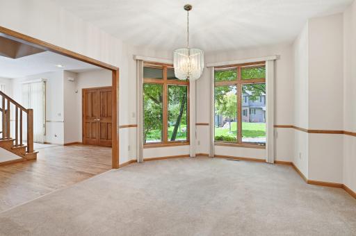 On the other side of the main entry foyer is a good size formal dining room. Large windows to the front.