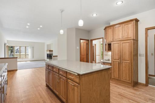 View across kitchen looking over large informal dining area and family room