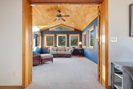 Sunroom on the main level off of the living room