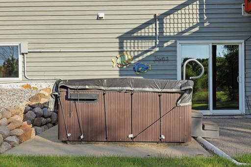 Hot tub in the backyard included.