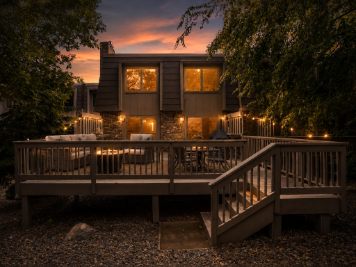Unique to this home is the private backyard with expansive deck