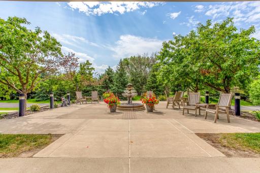 Enjoy thoughtfully designed shared outdoor spaces surrounded by mature trees and lush landscaping.