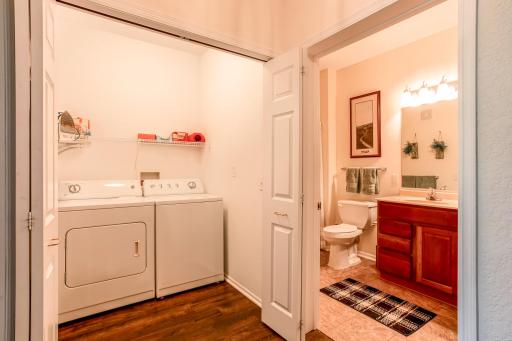 Thoughtful layout places the laundry area adjacent to the second full bathroom for everyday convenience.