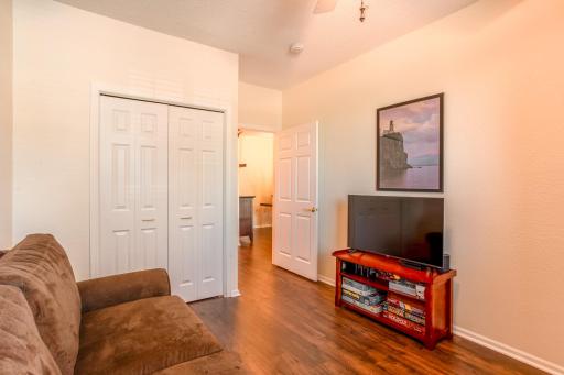 Versatile second bedroom provides ample room for guests, an office setup, or additional living space.